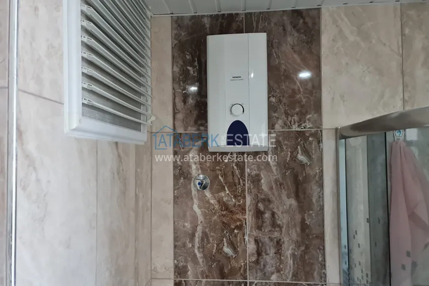 Приобрести Квартира в Махмутларе двухкомнатная с мебелью и видом на море и горы 18