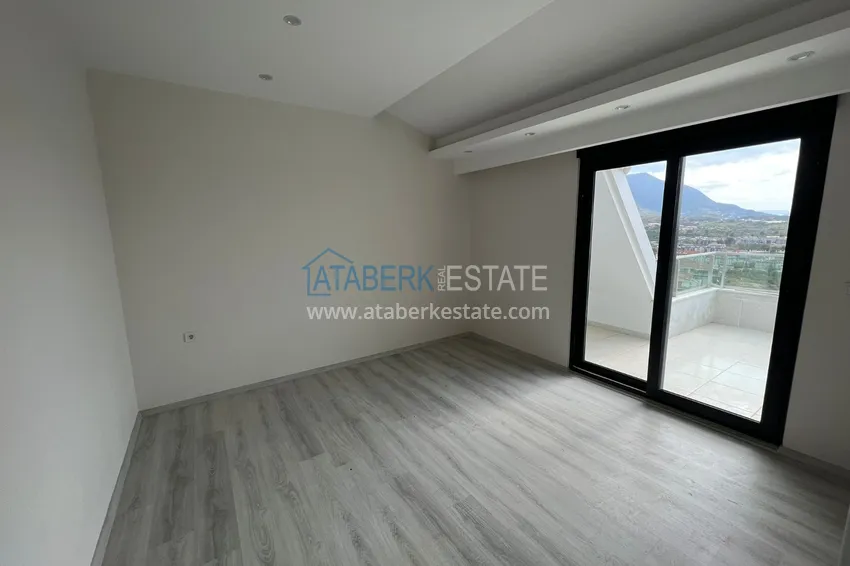 Приобрести Двухэтажный пентхаус с открытым видом на горы в районе Оба 18