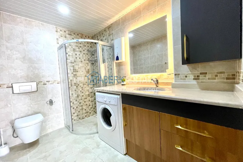 Приобрести Квартира меблированная в Махмутларе с видом на море и горы 18