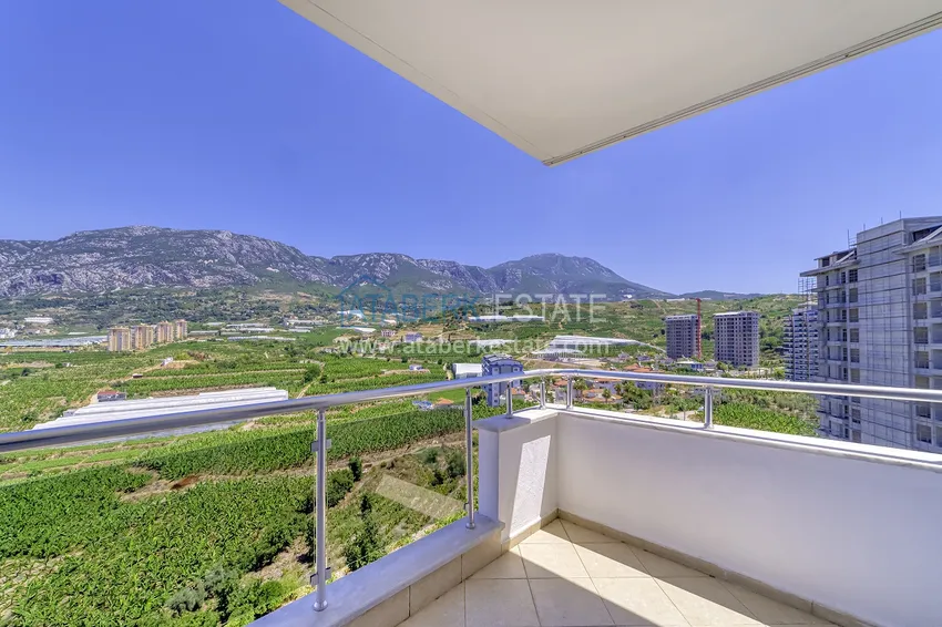 Приобрести Стильная видовая квартира в районе Махмутлар Алания 19 