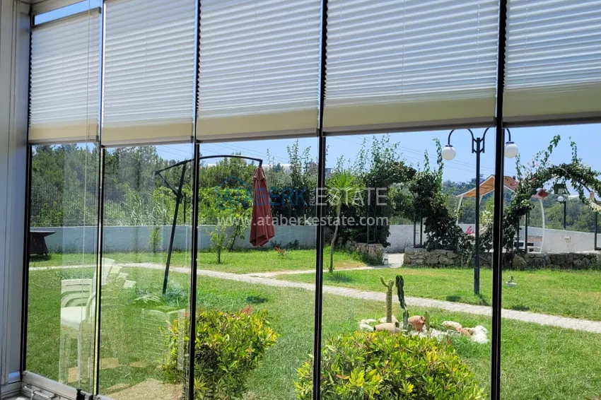 Приобрести Квартира с выходом в сад и застеклённым балконом в Оба в уютном жилом комплексе 19 