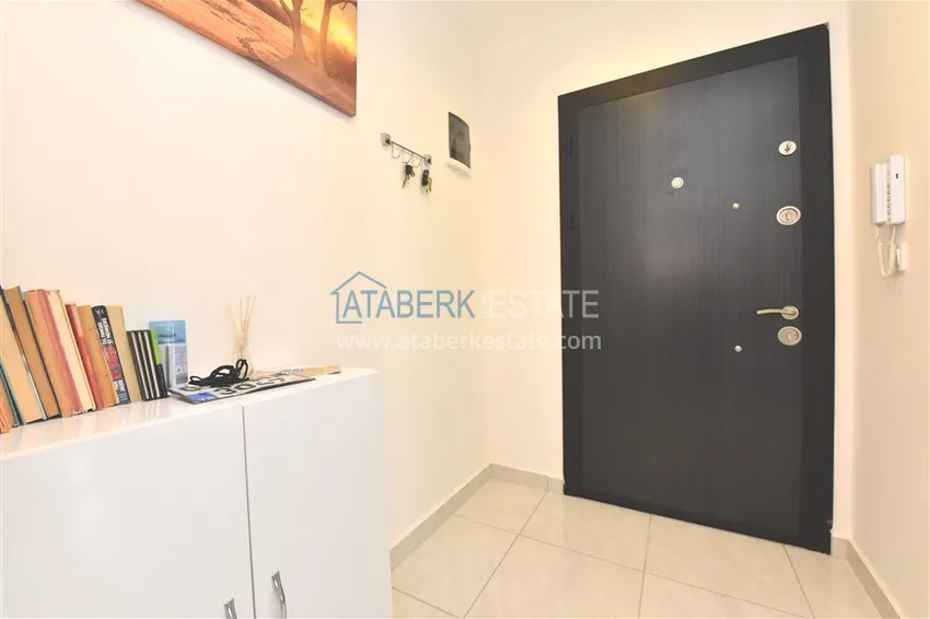 Приобрести Квартира в Махмутларе меблированная с видом на горы в комплексе комфорт-класса 1 