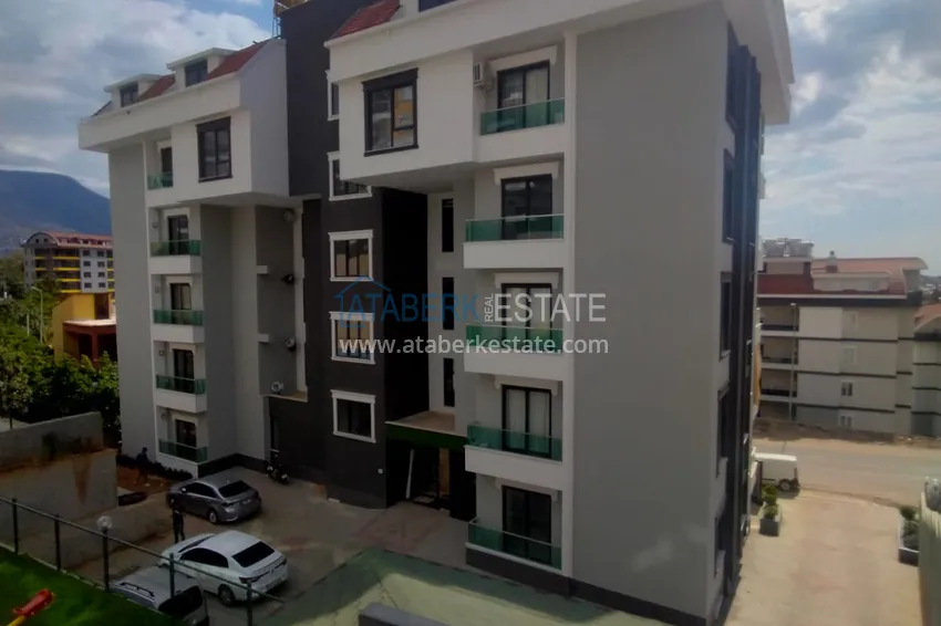 Квартира с 3 спальнями и чистовой отделкой в районе Оба 1