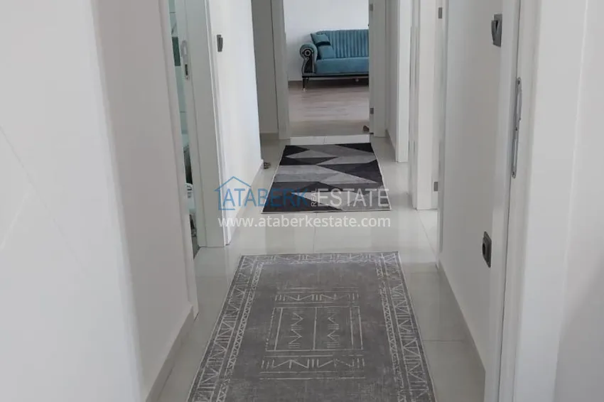 Приобрести Квартира с выходом в сад, видом на горы и новой мебелью в районе Оба - Алания 2