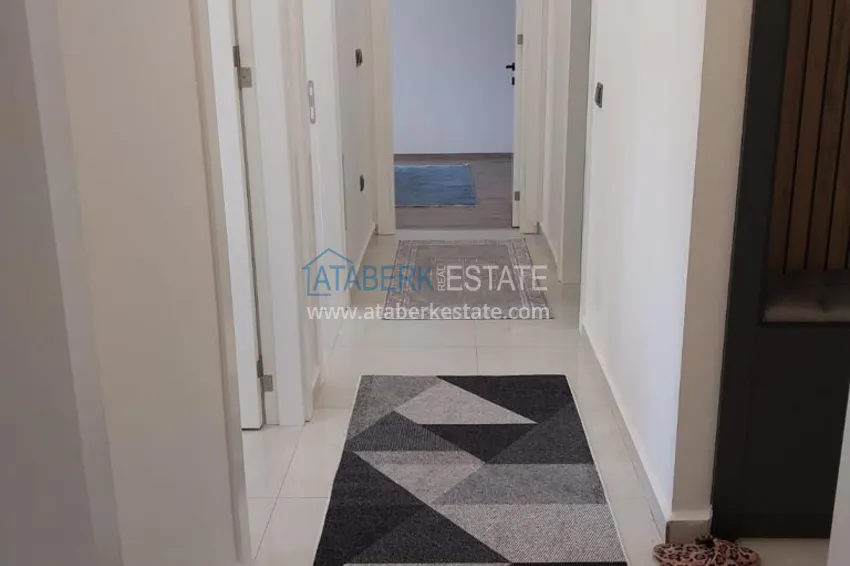 Приобрести Квартира с выходом в сад, видом на горы и новой мебелью в районе Оба - Алания 3