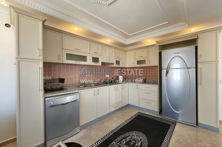 Приобрести Огромный пятикомнатный пентхаус с мебелью и видом на море – район Оба 7