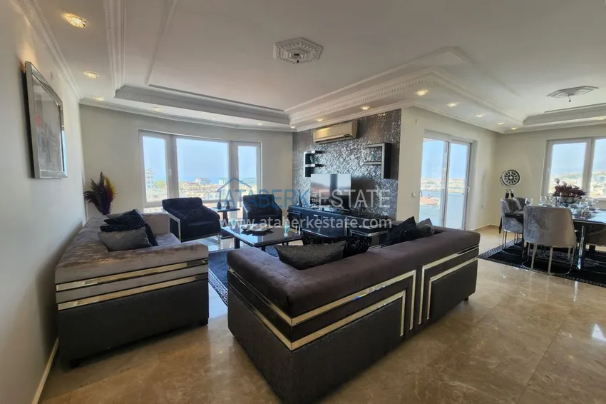Приобрести Огромный пятикомнатный пентхаус с мебелью и видом на море – район Оба 8