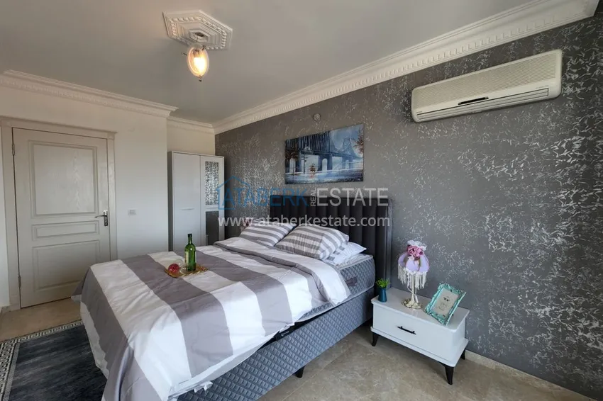 Приобрести Огромный пятикомнатный пентхаус с мебелью и видом на море – район Оба 23