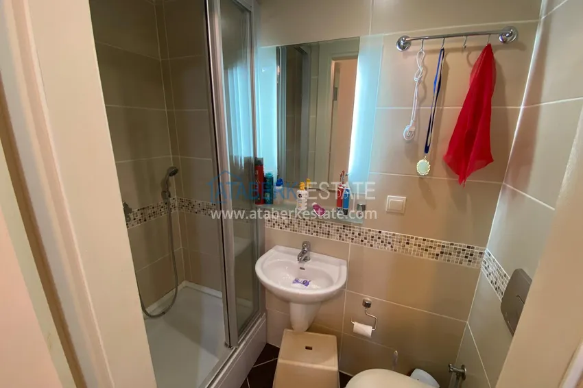 Приобрести Меблированные апартаменты с 2 спальнями в районе Махмутлар 23