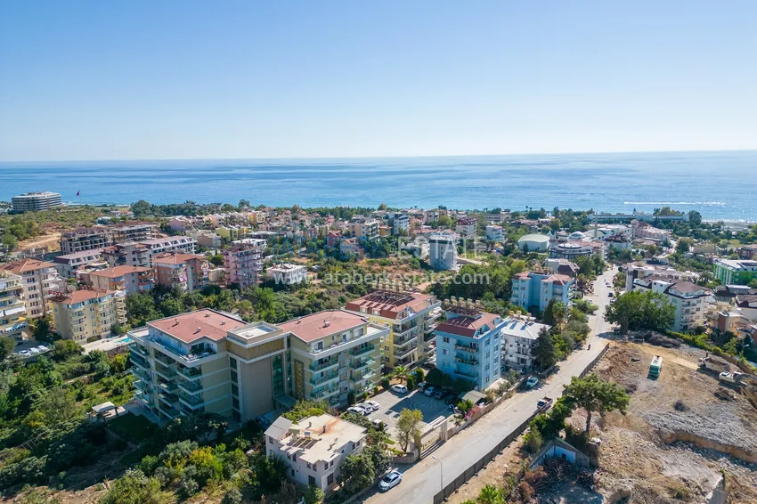 Апартаменты 1+1 с мебелью и видом на горы в районе Кестель, Алания 2 