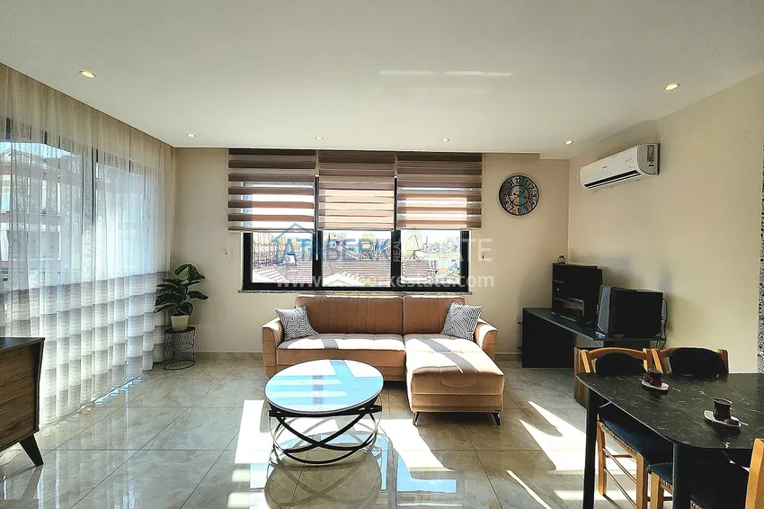 Приобрести Двухкомнатная меблированная квартира с видом на горы в Алании, районе пляжа Клеопатра 3 