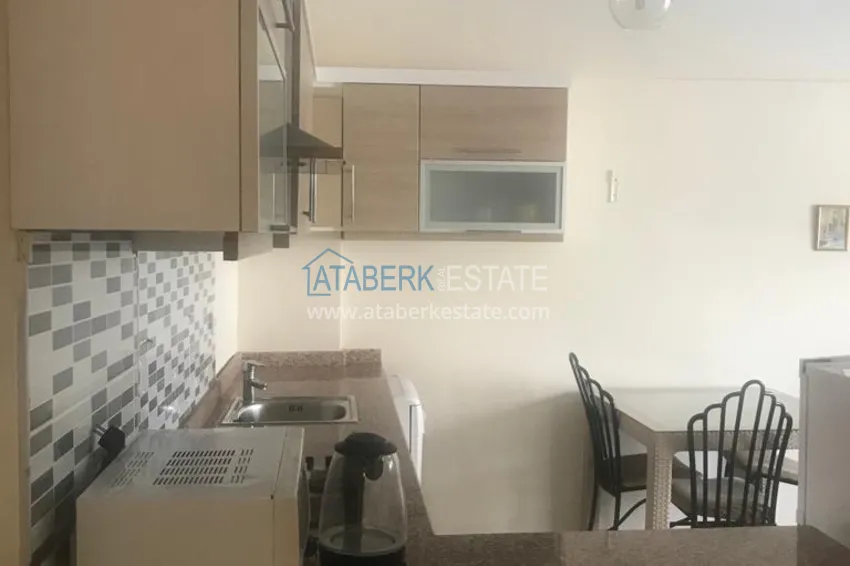 Приобрести Квартира 1+1 в Алании - район Оба, частично с мебелью 4