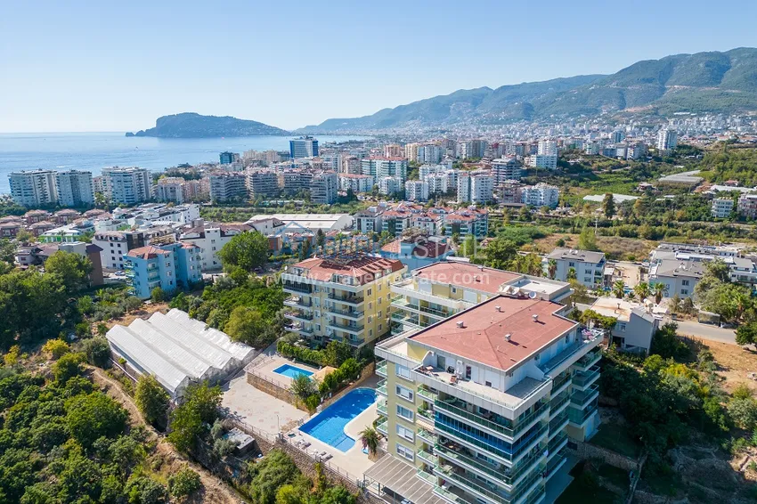 Апартаменты 1+1 с мебелью и видом на горы в районе Кестель, Алания 3 