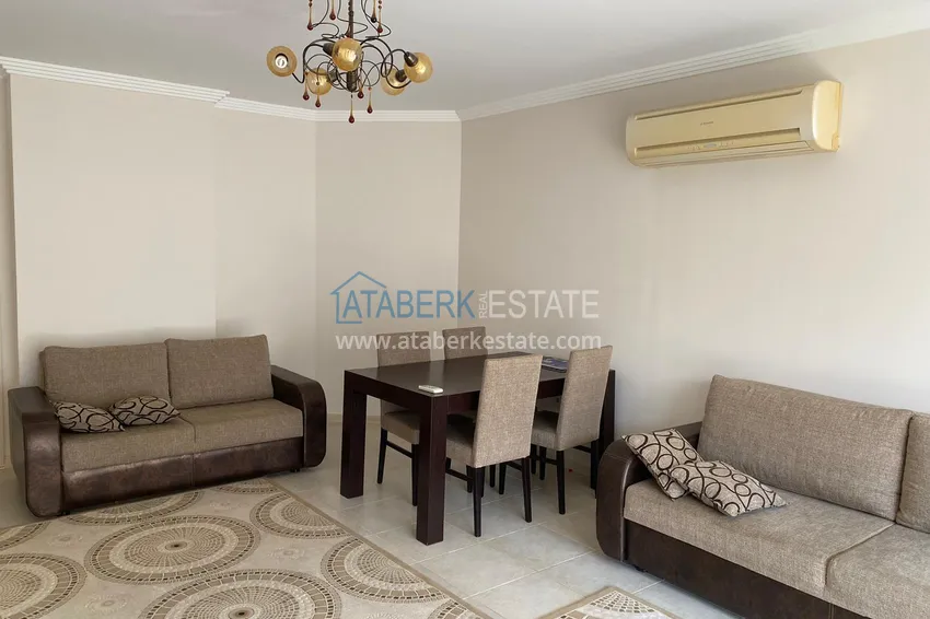 Приобрести Меблированные апартаменты с 2 спальнями в районе Махмутлар 4