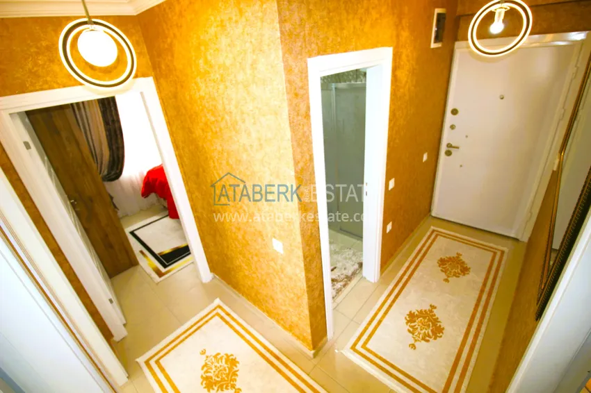 Приобрести Трехкомнатная квартира с новой мебелью в Джикджилли - район ТЦ Аланиум 3