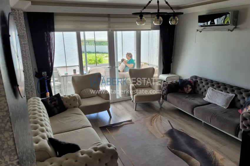 Приобрести Квартира с выходом в сад и застеклённым балконом в Оба в уютном жилом комплексе 3 