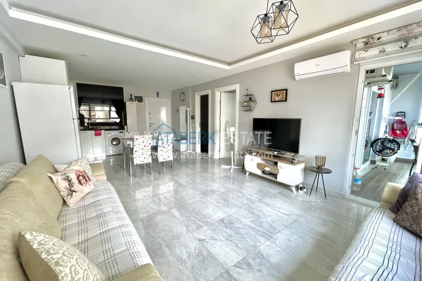 Приобрести Квартира в Махмутларе с мебелью и застеклённым балконом в молодом современном комплексе 3 