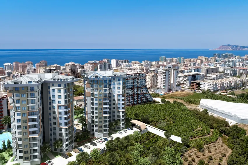 Квартиры от инвестора в строящемся жилом комплексе - Махмутлар, Алания 4 