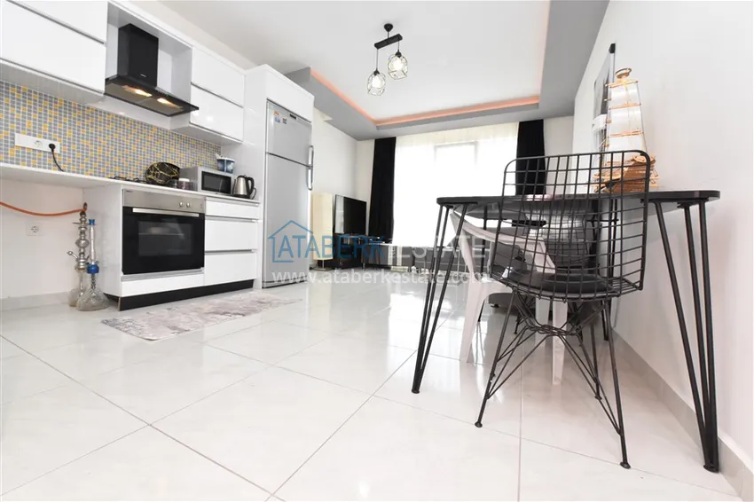 Приобрести Квартира в Махмутларе меблированная с видом на горы в комплексе комфорт-класса 4 