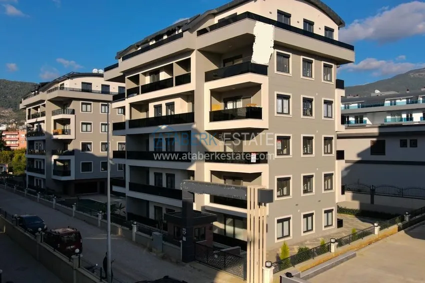 Квартира с выходом в сад, видом на горы и новой мебелью в районе Оба - Алания 4