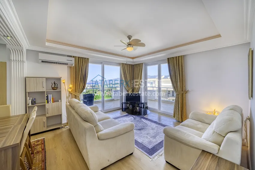 Приобрести Стильная видовая квартира в районе Махмутлар Алания 4 