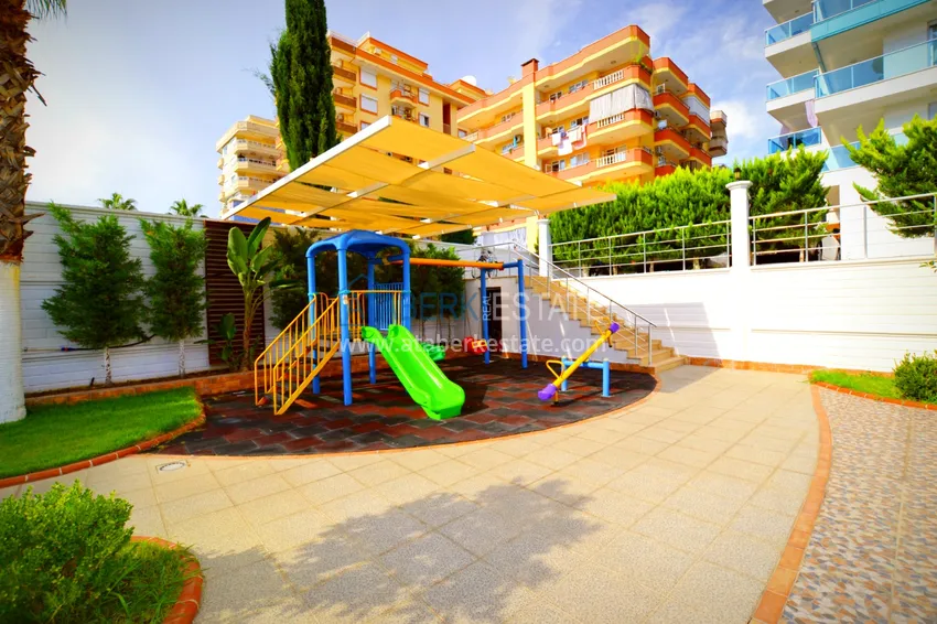 Аренда квартиры 1+1 в Махмутларе в комплексе на первой береговой линии B26 8 