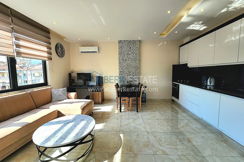 Приобрести Двухкомнатная меблированная квартира с видом на горы в Алании, районе пляжа Клеопатра 5 