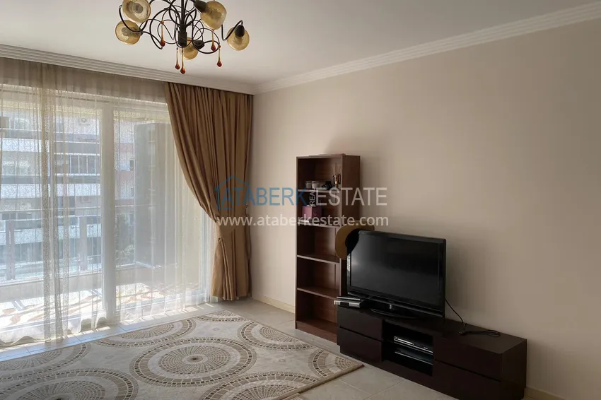 Приобрести Меблированные апартаменты с 2 спальнями в районе Махмутлар 5