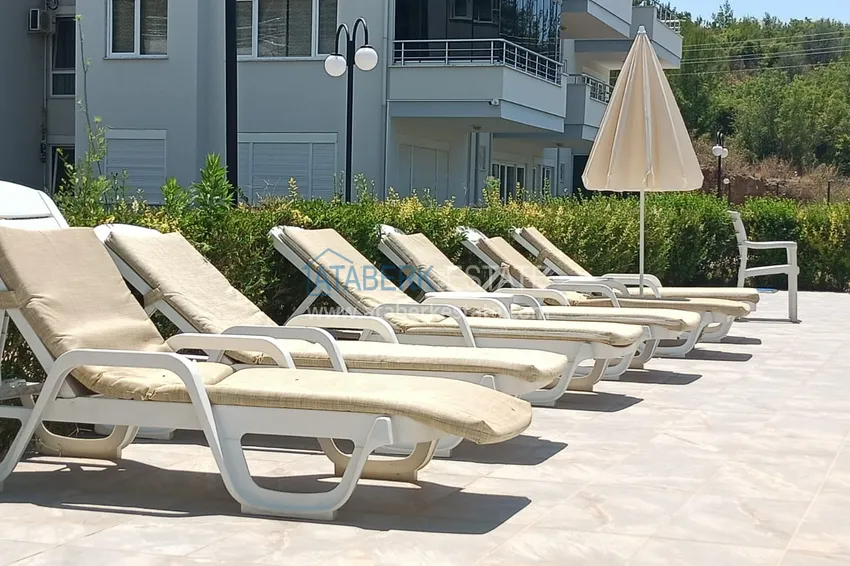 Квартира с выходом в сад и застеклённым балконом в Оба в уютном жилом комплексе 7 