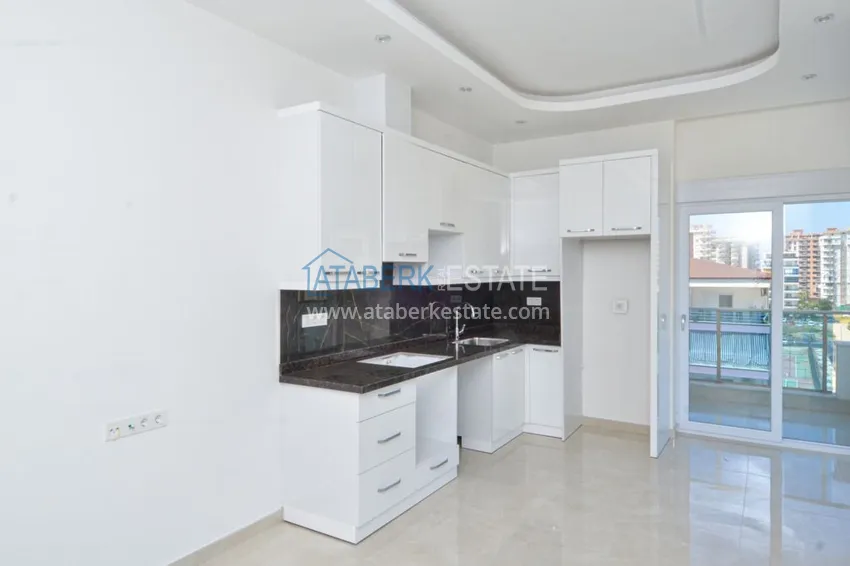 Приобрести Квартира в Махмутларе с чистовой отделкой, в комплексе европейского типа 6 