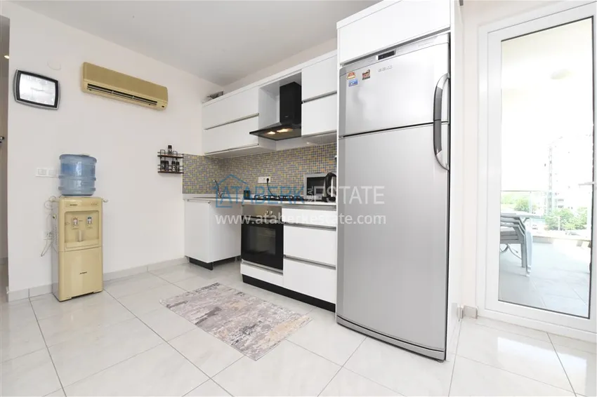 Приобрести Квартира в Махмутларе меблированная с видом на горы в комплексе комфорт-класса 5 