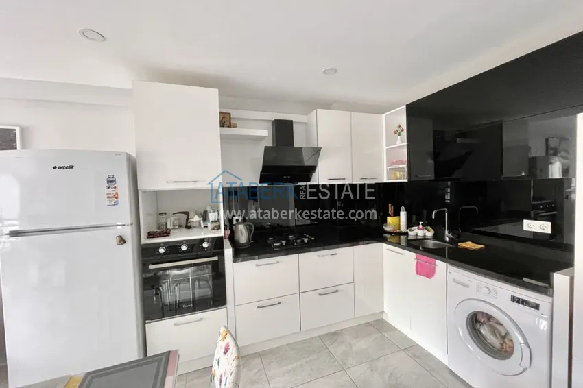 Приобрести Квартира в Махмутларе с мебелью и застеклённым балконом в молодом современном комплексе 6 