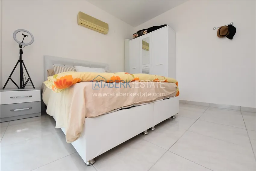 Приобрести Квартира в Махмутларе меблированная с видом на горы в комплексе комфорт-класса 6 