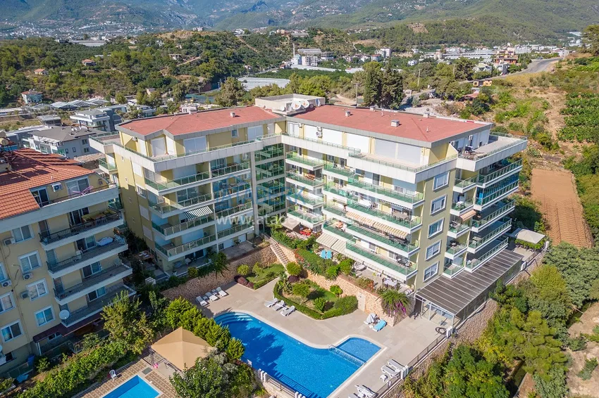 Апартаменты 1+1 с мебелью и видом на горы в районе Кестель, Алания 6 