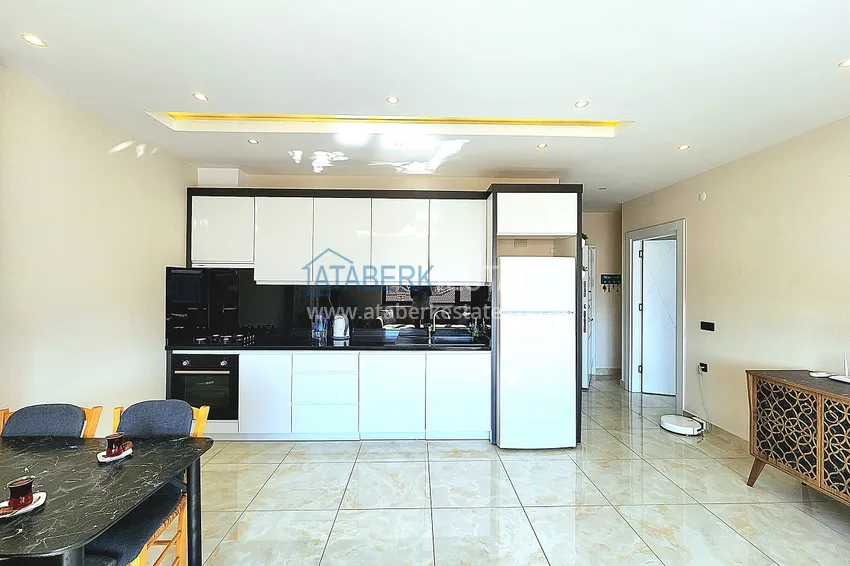 Приобрести Двухкомнатная меблированная квартира с видом на горы в Алании, районе пляжа Клеопатра 7 