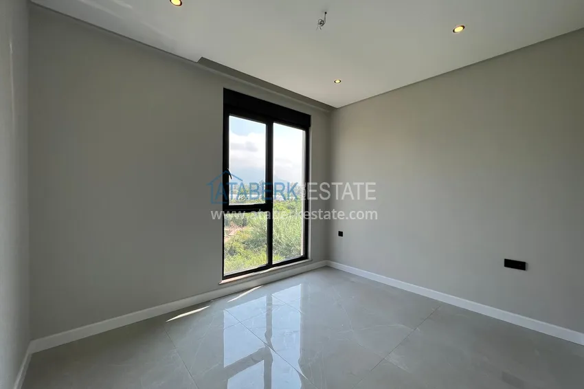 Приобрести Квартира в Алании район Оба с чистовой отделкой и видом на горы 6 