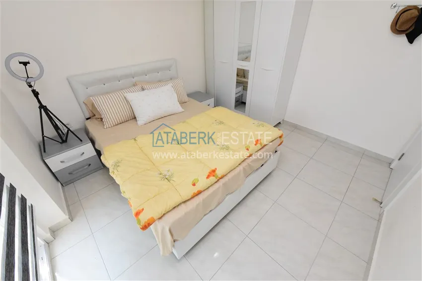 Приобрести Квартира в Махмутларе меблированная с видом на горы в комплексе комфорт-класса 7 