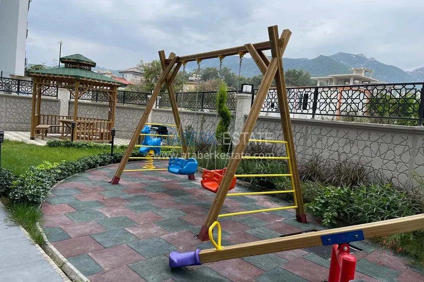 Квартира с выходом в сад, видом на горы и новой мебелью в районе Оба - Алания 7