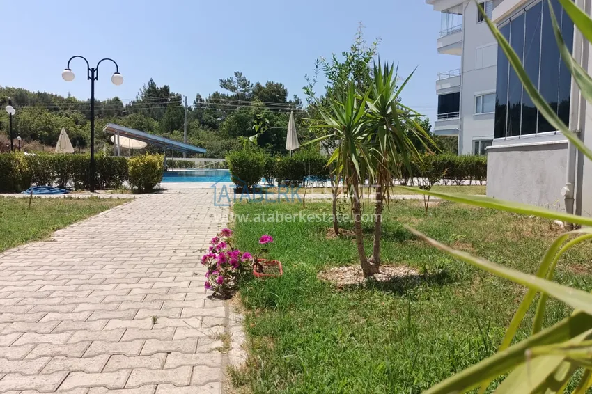 Квартира с выходом в сад и застеклённым балконом в Оба в уютном жилом комплексе 10 