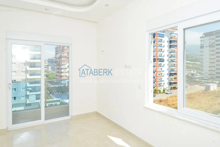 Приобрести Квартира в Махмутларе с чистовой отделкой, в комплексе европейского типа 9 