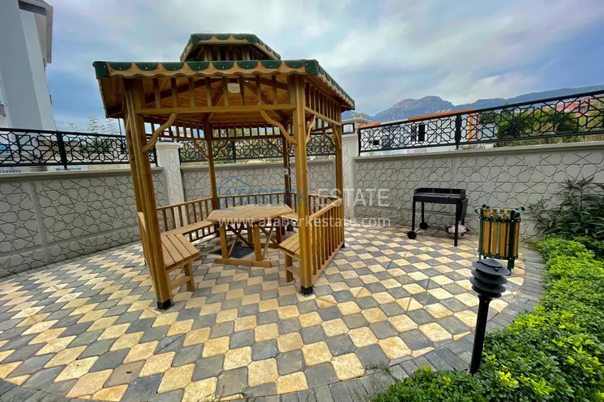 Квартира с выходом в сад, видом на горы и новой мебелью в районе Оба - Алания 8