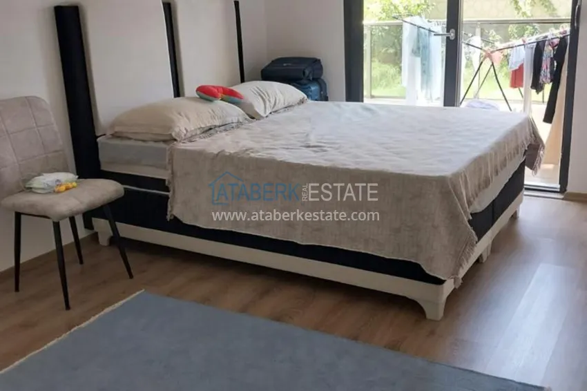 Приобрести Квартира с выходом в сад, видом на горы и новой мебелью в районе Оба - Алания 10