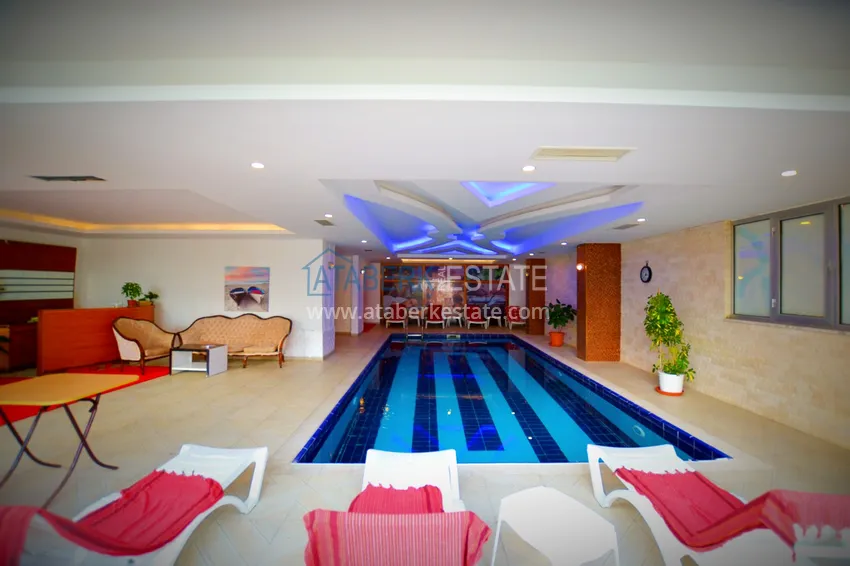 Аренда квартиры 1+1 в Махмутларе в комплексе на первой береговой линии B26 12 