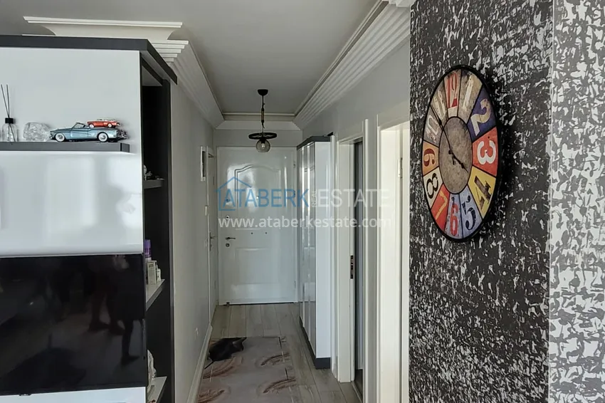 Приобрести Квартира с выходом в сад и застеклённым балконом в Оба в уютном жилом комплексе 8 