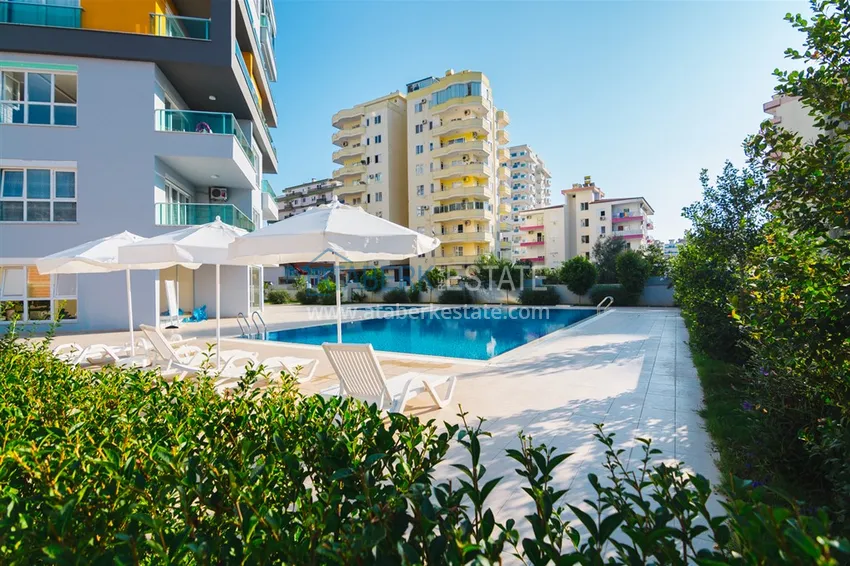 Квартира в Махмутларе с мебелью и застеклённым балконом в молодом современном комплексе 11 