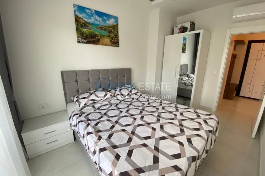 Приобрести Аренда двухкомнатной квартиры в районе Махмутлар, Алания в современной резиденции 9