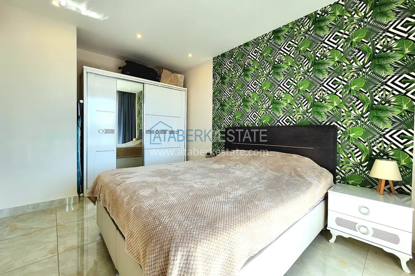 Приобрести Двухкомнатная меблированная квартира с видом на горы в Алании, районе пляжа Клеопатра 10 