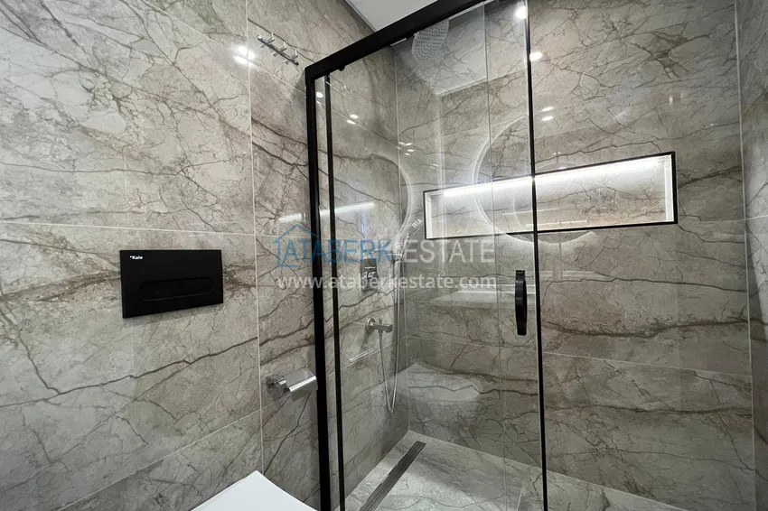 Приобрести Квартира в Алании район Оба с чистовой отделкой и видом на горы 9 