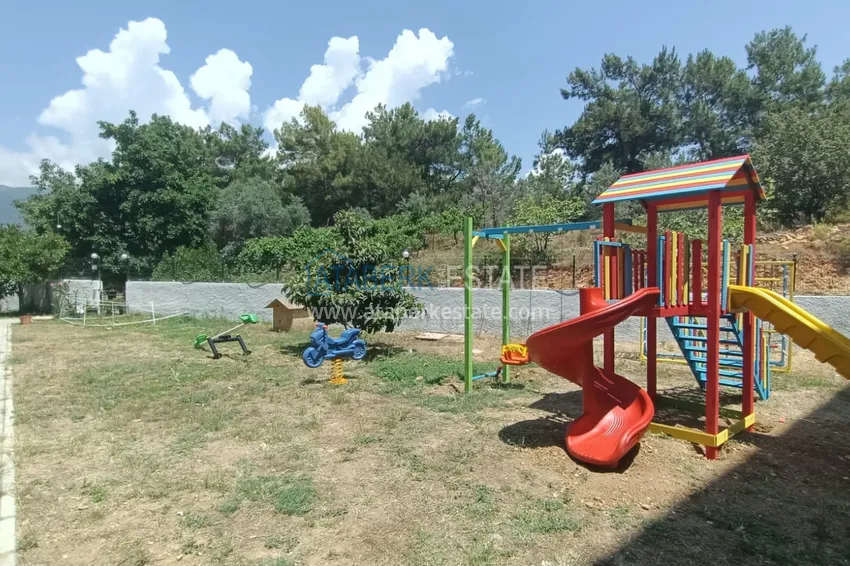 Квартира с выходом в сад и застеклённым балконом в Оба в уютном жилом комплексе 12 