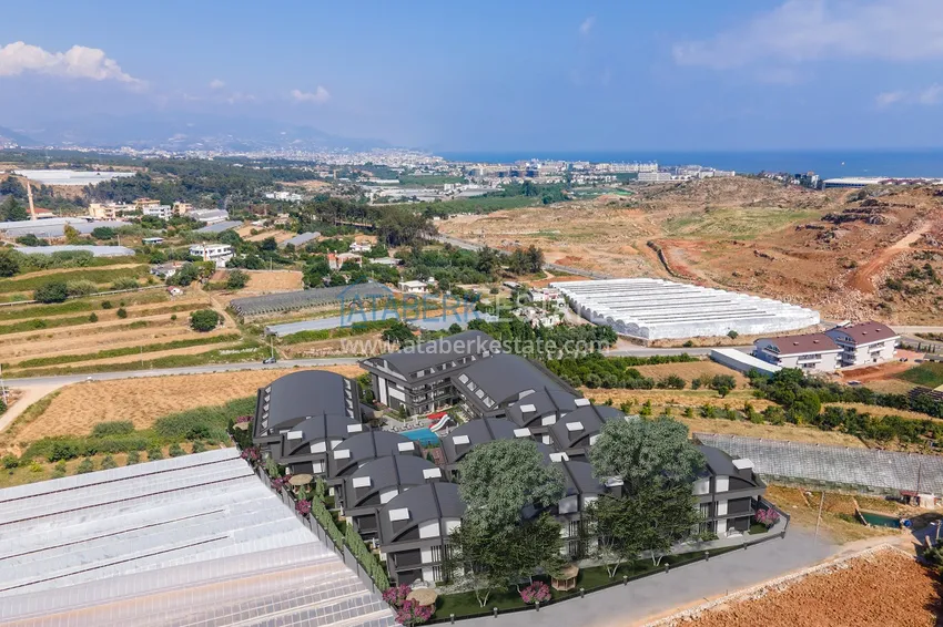 Недвижимость от застройщика в Алании район Тюрклер - новый проект резиденции с апартаментами и виллами 3 